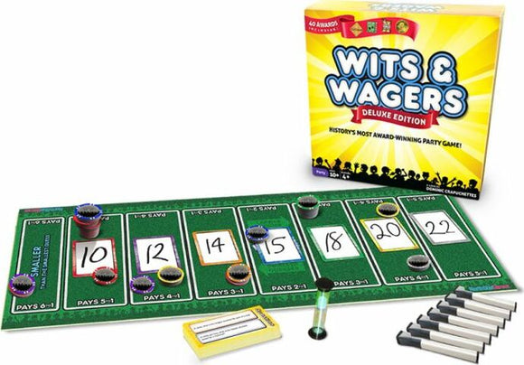 Wits & Wagers Deluxe Edition game set featuring a colorful box, game board with numbered betting spaces, chips for placing bets, an hourglass timer, and markers. Perfect for social gatherings and party entertainment.