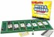 Wits & Wagers game by North Star Games showcases a green tabletop with numbered betting boards, a variety of game pieces, and a bright yellow box featuring the game's title. Perfect for family game nights, this trivia-based betting game combines strategy and fun, allowing players to win by wagering on correct answers.