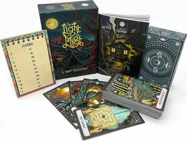 The Light in the Mist game by Postcurious featuring an intricately designed box. The package includes a tarot-themed journal, beautifully illustrated tarot cards, and a guidebook with a mystical forest scene. The cards display detailed artwork with symbols and imagery related to the tarot, inviting players to explore themes of mystery and adventure.