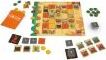 Sobek board game by Pandasaurus Games, featuring a colorful game board with tiles, tokens, and a die laid out for play. The game involves strategy and resource management with thematic elements from ancient Egypt.