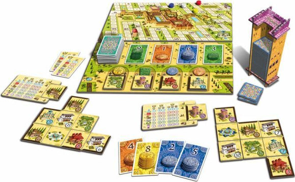 An image of the Alhambra board game set up for play. The game features a colorful board depicting the Alhambra, with cards, tiles, and wooden pieces arranged around it. There are various player cards showcasing buildings, currency, and scoring options, along with a tall tower piece representing the game's mechanics.