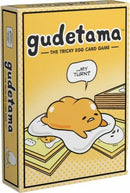 Gudetama card game box featuring a lazy, cartoon yolk character lounging on a plate with the text 'my turn?' The bright yellow packaging showcases the playful theme of the game.