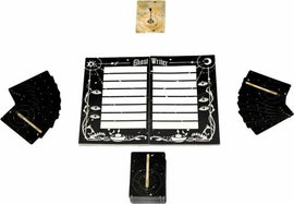Phantom Ink by RESONYM GAMES is an interactive game featuring a unique layout with a central game board titled 'Ghost Writer.' The board showcases spaces for writing, surrounded by a mystical design with astrological symbols. The kit includes multiple card decks and a hand-held pointer, inviting players to engage in a unique storytelling experience.