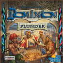 Dominion: Plunder game box featuring three characters excitedly examining a treasure chest filled with gold coins, set against a backdrop of a ship and vibrant scenery. The title 'Dominion' is prominently displayed at the top, with 'Plunder' underneath, indicating this is an expansion for the popular card game.