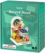 Product packaging of the Record Mood Study Model Kit by Robotime. The box features a colorful illustration of a whimsical study area complete with books, flowers, and decorative elements, designed for a DIY modeling experience.