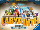 Labyrinth Team Edition board game by Ravensburger, featuring vibrant illustrations of characters and intricate pathways. The game box displays the dynamic layout of the labyrinth, emphasizing teamwork for players aged 8 and up.
