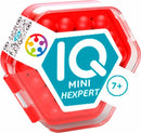 The IQ Mini Hexpert, a mechanical puzzle from Smart Toys & Games, is displayed in assorted colors with a hexagonal design. The product is contained in a transparent red case that showcases colorful balls inside. Suitable for ages 7 and up, it promotes problem-solving skills and provides hours of challenging fun.