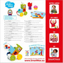 SMARTMAX My First Build & Drive kit featuring colorful magnetic pieces including a smiling character figure, wheels, and shape-building components, designed for toddlers to enhance fine motor skills, color and shape recognition, and creativity. The set includes challenge cards for various building configurations.