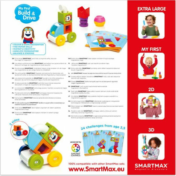SMARTMAX My First Build & Drive kit featuring colorful magnetic pieces including a smiling character figure, wheels, and shape-building components, designed for toddlers to enhance fine motor skills, color and shape recognition, and creativity. The set includes challenge cards for various building configurations.