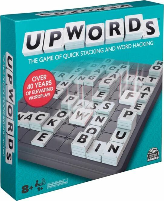 The Upwords game by Hasbro, featuring a vibrant teal box design with a prominent title at the top. The game board inside displays a grid of letter tiles, showcasing various words stacked and played, such as 'WACK' and 'BIN'. The box highlights that it is the game of quick stacking and word hacking, with a note stating 'Over 40 years of elevating wordplay'. Suitable for ages 8 and up.