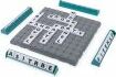 The Upwords game by Hasbro, featuring a grid board with raised tiles showcasing various letters. The game is surrounded by letter tiles, ready to create words vertically and horizontally for strategic play. Ideal for word game enthusiasts looking to challenge their vocabulary skills.
