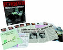 Cold Case: Murder with Interest game by ThinkFun, featuring a mystery investigation kit. Includes various documents such as newspapers, photos of suspects, and clues for players to solve the murder mystery.