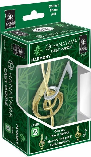 The Hanayama Cast Harmony mechanical puzzle features an intricate design resembling a musical note, showcasing a combination of gold and silver colors. The packaging shows the puzzle and highlights its Level 2 difficulty, along with a challenge prompt to take it apart and reassemble it. Suitable for puzzle enthusiasts, this item comes in an eye-catching green box adorned with musical symbols and the brand logo, making it a perfect gift for both casual and serious puzzlers.