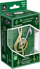 The Hanayama Cast Harmony mechanical puzzle features an intricate design resembling a musical note, showcasing a combination of gold and silver colors. The packaging shows the puzzle and highlights its Level 2 difficulty, along with a challenge prompt to take it apart and reassemble it. Suitable for puzzle enthusiasts, this item comes in an eye-catching green box adorned with musical symbols and the brand logo, making it a perfect gift for both casual and serious puzzlers.