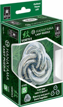 Hanayama Cast Vortex mechanical puzzle displayed in a clear plastic box. The puzzle features a spiraled metal design, showcasing its intricate detailing. The packaging highlights its challenge level of 5 and includes the text, 'Can you take it apart? Now try and put it back together!' This strong visual appeal makes it perfect for puzzle enthusiasts and collectors.