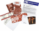 A collection of game materials for 'A Taste for Wine and Murder' by University Games. Includes brochures titled 'Party Planner' and 'Tiny Bubbles', a DVD labeled 'Cut 2 Study', and an FBI memo, all arranged stylishly for interactive mystery gameplay.