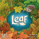 The game 'Leaf' by Weird City Games features a vibrant illustration of various leaves in shades of green, orange, and yellow, with a small hedgehog peeking from behind a blue pond-like shape where the title 'Leaf' is prominently displayed. The artwork has a whimsical, nature-inspired design.