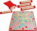 A Scrabble game by Winning Moves, featuring a colorful game board with various letter tiles laid out strategically. A red bag filled with letter tiles, some tiles placed on racks, showcasing letters in the current gameplay. This classic word game promotes vocabulary and strategic thinking.