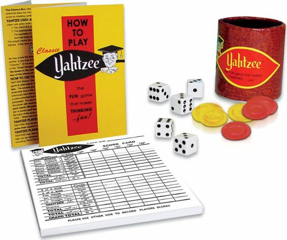 Yahtzee game set from Winning Moves including a colorful instruction booklet, five dice, a score card, and plastic scoring chips in red and yellow. The game is packaged in a round canister.