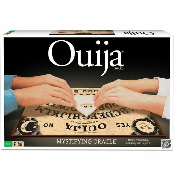 Classic Ouija board game by Winning Moves, featuring a wooden board with mystical graphics and a planchette. Two hands are gently touching the planchette, engaged in a spirited session of communication.