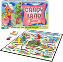 The Candy Land board game by Winning Moves is displayed with its colorful box and components. The game features a vibrant game board depicting a whimsical candy-themed landscape with play pieces in various colors, including yellow, green, and red, along with shuffled cards. Celebrating over 65 years of family fun, the game aims to provide an engaging experience for young players.