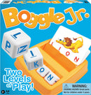 Boggle Jr. game box featuring colorful design. The box displays the title 'Boggle Jr.' prominently, along with the game pieces that include letter cubes and an illustrated card showing a lion. It highlights 'Two Levels of Play!' and includes a warning about small parts. Suitable for children aged 3 and up.
