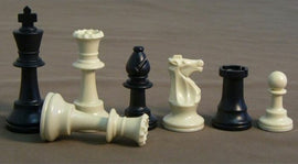 A set of 3.75-inch plastic triple weighted chessmen in black and ivory colors, showcasing the various pieces including the king, queen, knight, and pawns, arranged neatly in a line for a classic game of chess.