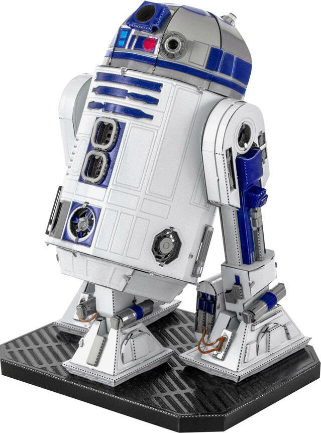 A detailed model of R2-D2, the iconic droid from Star Wars, created by Fascinations. The model showcases vibrant blue and silver colors, featuring intricate detailing on the panels and legs, and stands on a textured black base. It is perfect for collectors and DIY enthusiasts.