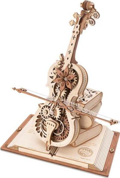 A beautifully crafted wooden music box resembling a cello, showcasing intricate gears, floral designs, and a bow. The music box is placed on an open book base, emphasizing its artistic craftsmanship.