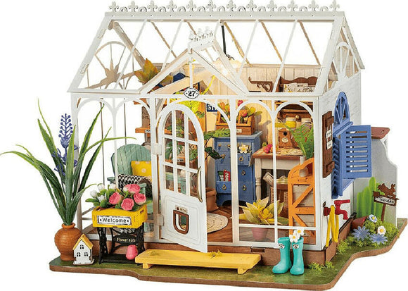 The Dreamy Garden House by Robotime is a charming DIY kit featuring a detailed miniature greenhouse. The design showcases vibrant flowers, a welcome sign, gardening tools, and a cozy interior with colorful furniture. This delightful model captures the essence of a tranquil garden space, perfect for hobbyists and craft enthusiasts.