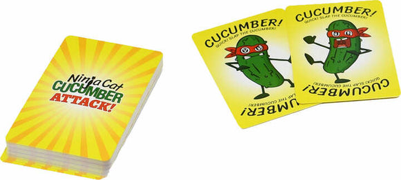Ninja Cat Cucumber Attack card game shown with colorful packaging and illustrated game cards. The packaging features bright yellow rays and bold text, while the cards depict a fun cucumber character wearing a ninja mask and encouraging players to slap the cucumber.