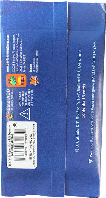 The Sea Salt and Paper: Extra Salt game expansion by Pandasaurus Games. It features a vibrant blue packaging with colorful logos and illustrations, list of contents including 13 cards, and details about the creators on the back. Ideal for adding new dimensions to your Sea Salt and Paper game experience.
