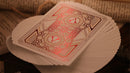 Cards fanned out showing the metallic backs of the playing cards
