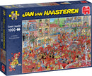 La Tomatina jigsaw puzzle by Jumbo featuring a vibrant, chaotic scene of a tomato-throwing festival. The puzzle box shows people celebrating, enjoying the festivities, with colorful buildings and various characters illustrated in a humorous style.
