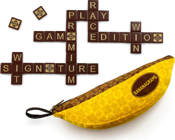 The Bananagrams Signature Edition game features a unique banana-shaped pouch and colorful letter tiles. The game is laid out with tiles spelling 'Bananagrams Signature Edition' in a crossword style, showcasing the fun and educational aspect of the game. Perfect for family game nights or educational activities.