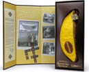 The Bananagrams Signature Edition game, featuring a banana-shaped pouch and a decorative box. Inside, there is an inspiring message, alongside photos showcasing the game's history and a commitment to fun and family engagement. Perfect for word enthusiasts and game nights.