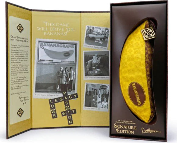 The Bananagrams Signature Edition game, featuring a banana-shaped pouch and a decorative box. Inside, there is an inspiring message, alongside photos showcasing the game's history and a commitment to fun and family engagement. Perfect for word enthusiasts and game nights.