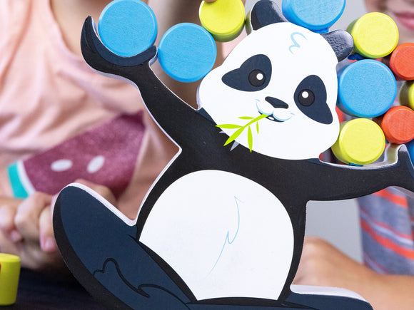 BoomBoom the Balancing Panda game features a playful panda character balancing colorful wooden discs. Suitable for children, this engaging game encourages fine motor skills and hand-eye coordination as players take turns stacking discs without toppling the panda.