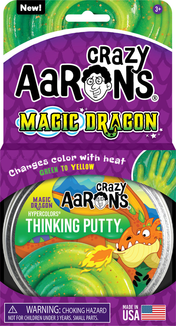 A 4-inch tin of Crazy Aaron's Thinking Putty in Magic Dragon color, featuring vibrant green and yellow hues that change with heat. The packaging includes a playful dragon design, indicating the putty's ability to transform color, with a warning about small parts for children under three. Perfect for fidgeting and creative play.