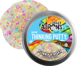 A round tin of Crazy Aaron's Mini Funky Fidget Thinking Putty, displaying a colorful, translucent putty filled with vibrant confetti-like spots. The tin is silver with a bright blue label featuring the product name and age recommendation of 3+ years. The putty is shown partially out of the tin, emphasizing its playful texture and eye-catching colors.