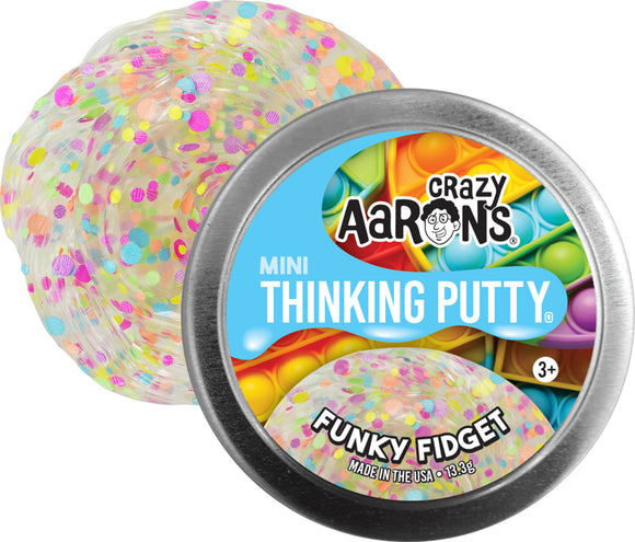 A round tin of Crazy Aaron's Mini Funky Fidget Thinking Putty, displaying a colorful, translucent putty filled with vibrant confetti-like spots. The tin is silver with a bright blue label featuring the product name and age recommendation of 3+ years. The putty is shown partially out of the tin, emphasizing its playful texture and eye-catching colors.