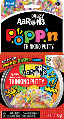 Crazy Aaron's Thinking Putty Poke'n Dots is packaged in a colorful container. The putty features vibrant, sprinkle-like dots. The product is designed for fun sensory play, promoting creativity with a texture that crackles, pops, and snaps when handled. Suitable for ages 3 and up, this playful putty offers an engaging experience whether being stretched or squeezed.