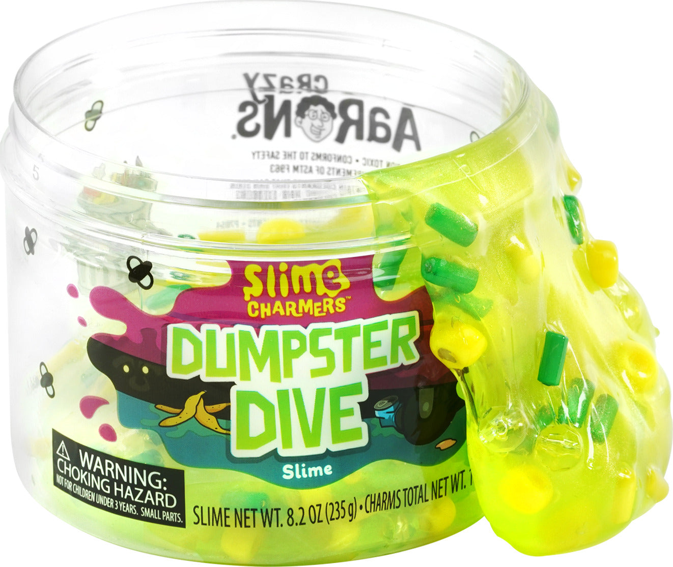 A clear container of Crazy Aaron's Dumpster Dive Slime Charmers, featuring vibrant yellow, green, and pink slime with colorful charms embedded inside. The slime is oozing out of the container, highlighting its squishy, gooey texture. The label displays fun graphics and the product name in bold lettering.