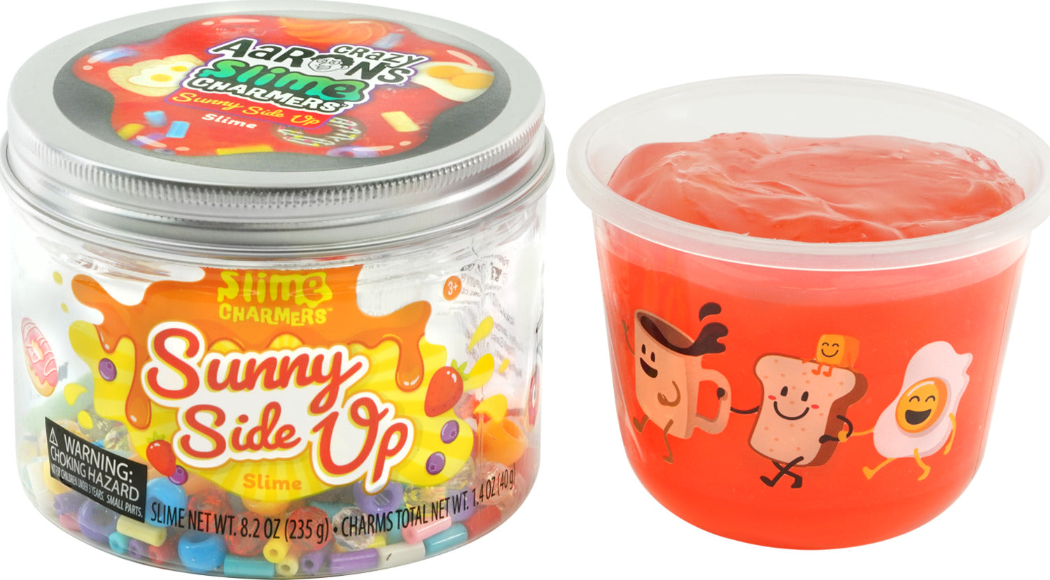 Sunny Side Up Slime Charmers by Crazy Aaron features a vibrant jar filled with colorful beads and a cup of soft, gooey slime. The jar has a playful design with the product name and a warning label. The accompanying container showcases cheerful cartoon characters, including a smiling egg, a happy piece of toast, and a joyful coffee cup, all inviting creativity and fun play.