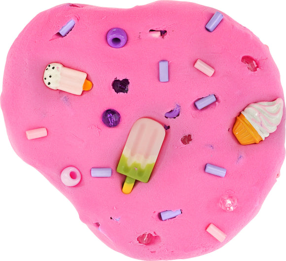 A vibrant pink slime with cute toppings, including miniature ice cream cones and popsicles. The slime is dotted with colorful beads and sprinkles, creating a fun, playful aesthetic perfect for sensory play.