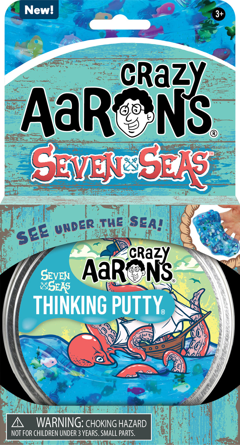 Crazy Aaron's Thinking Putty - Seven Seas 4" features vibrant colors and a playful ocean theme, depicting a colorful octopus and a ship. The tin is designed with a nautical motif and includes a warning for small parts. Perfect for sensory play, stress relief, and creativity.