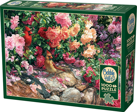 The Garden Wall jigsaw puzzle by Cobble Hill showcases a vibrant scene with colorful flowers and two cardinals perched among the blossoms. The puzzle consists of 1000 pieces and includes a poster for reference. Perfect for nature lovers and puzzle enthusiasts alike.