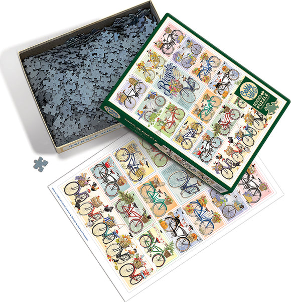 A colorful jigsaw puzzle by Cobble Hill featuring an assortment of bicycles in various styles and designs. The box is open, revealing many intricate pieces inside, while a picture of the completed puzzle lies next to it, showcasing vibrant illustrations of bikes adorned with flowers and playful elements.