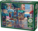 Cobble Hill jigsaw puzzle titled 'Rainy Day Stroll' featuring a picturesque street scene with vibrant shops, a cafe, flowers, and a rainy ambiance. Ideal for puzzle enthusiasts with 1000 pieces and includes a poster for reference.