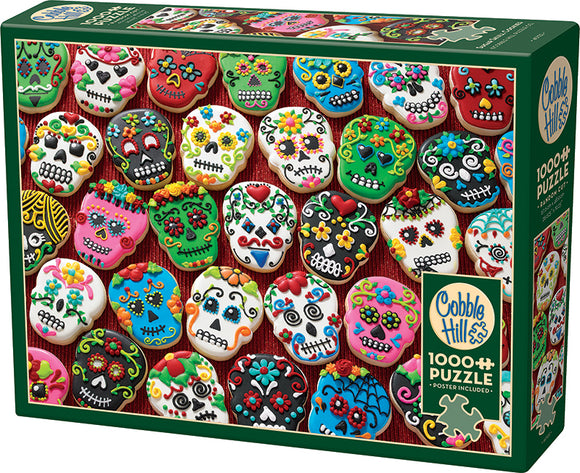 A colorful jigsaw puzzle featuring an assortment of decorated sugar skull cookies. The cookies are intricately designed with vibrant colors, flowers, and faces, displayed against a patterned background. This 1000-piece puzzle includes a poster and is part of the Cobble Hill collection.